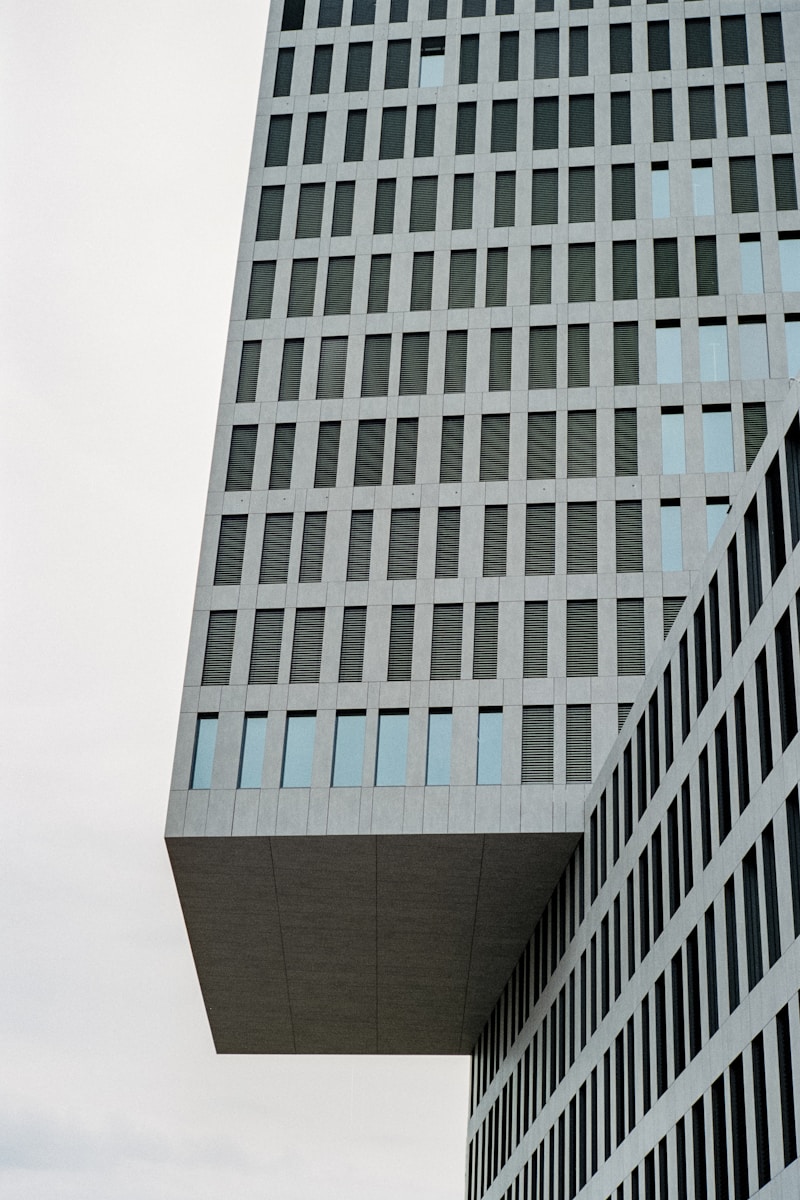 a very tall building with a clock on it's side